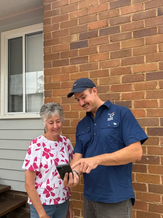 Wattle Cleaning Staff Assisting a Customer