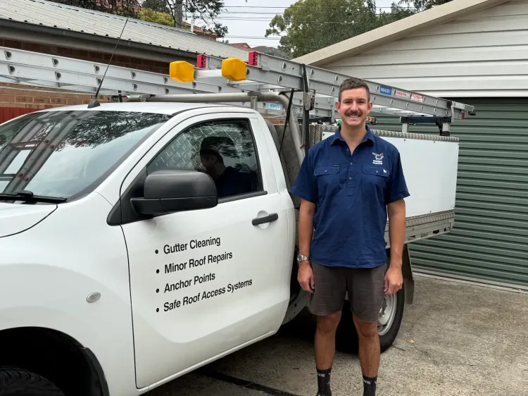 Wattle Cleanings Technician Judah in Front Of His Gutter Cleaning Ute