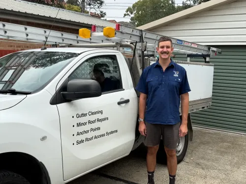 Wattle Cleanings Technician Judah in Front Of His Gutter Cleaning Ute